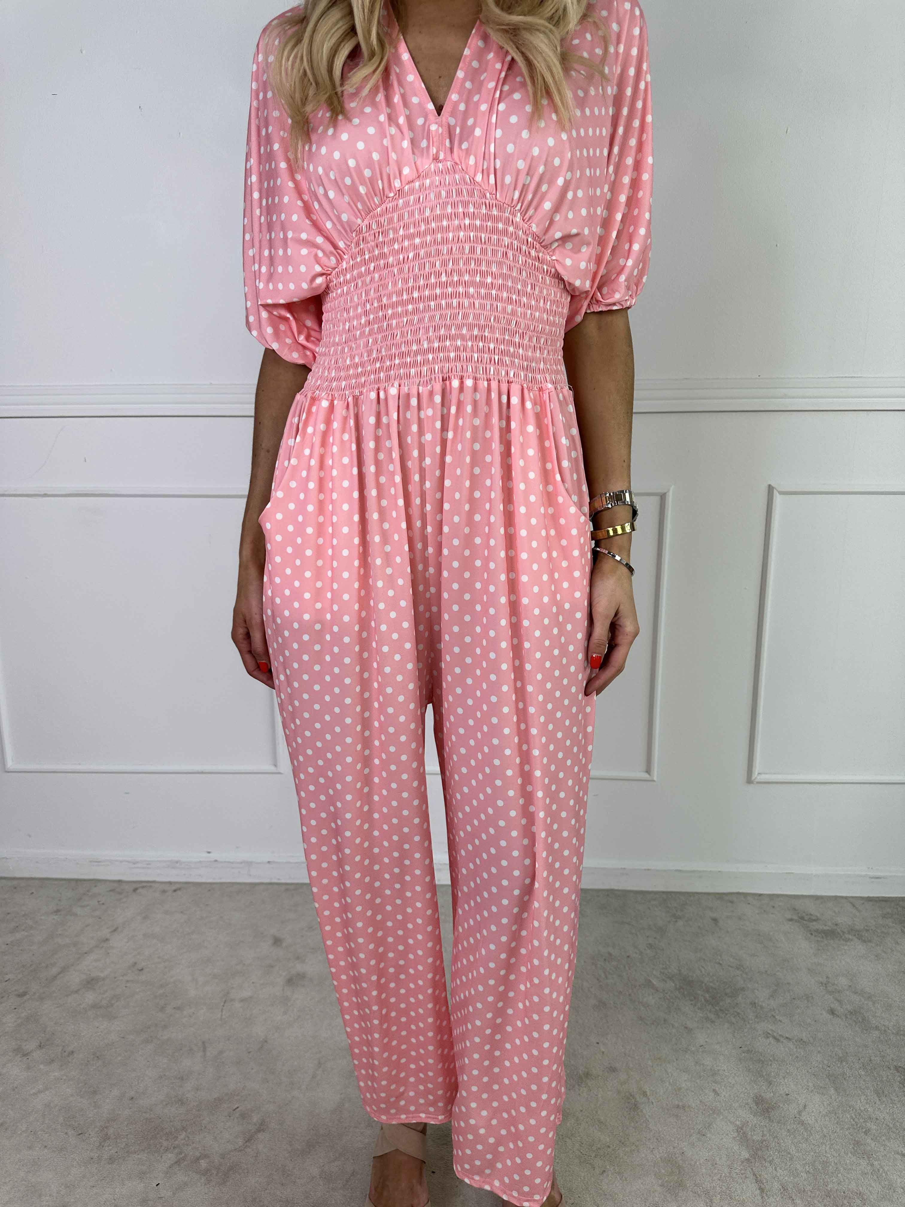 Grace - Stretchig jumpsuit med vita prickar